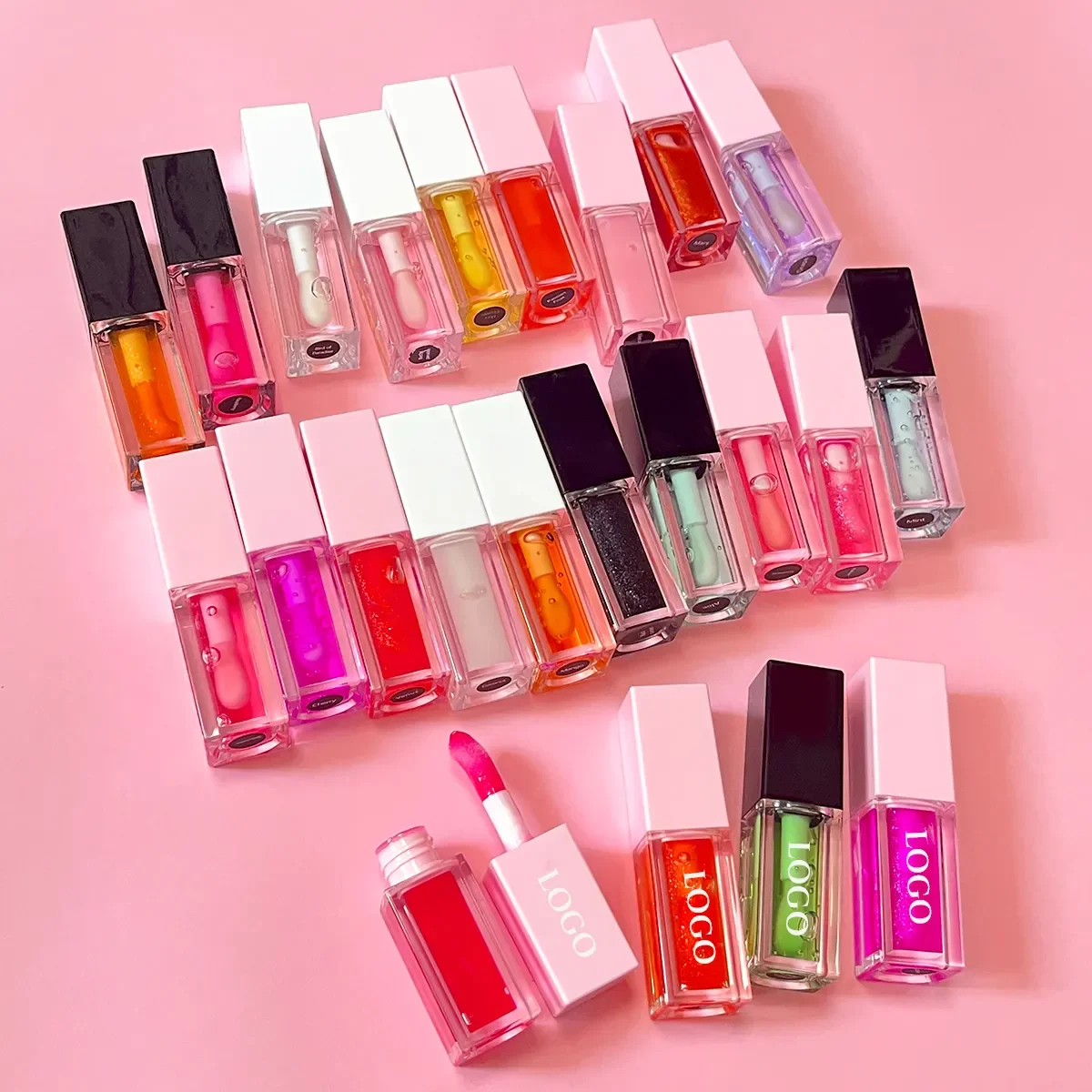 Wholesale plumping liquid layer lip care oil custom logo vegan clear moisturizing scented flavored glossy fat lip oil