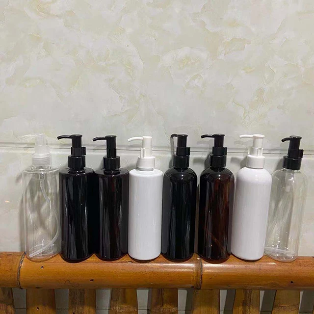 Hengjian 300ml grey black white amber plastic bottle with lotion pump for shampoo and cosmetic lotion cream and essential oil