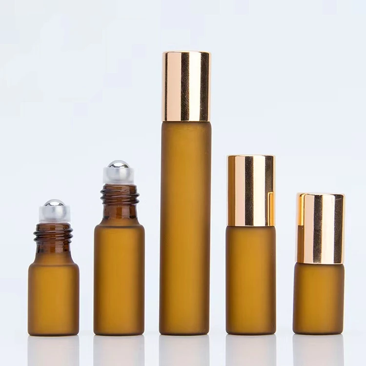 OEM ODM chinese wind 3ml 5ml 10ml essential oil frosted amber white glass ball bottles roller ball lip tube glass roll-on bottle