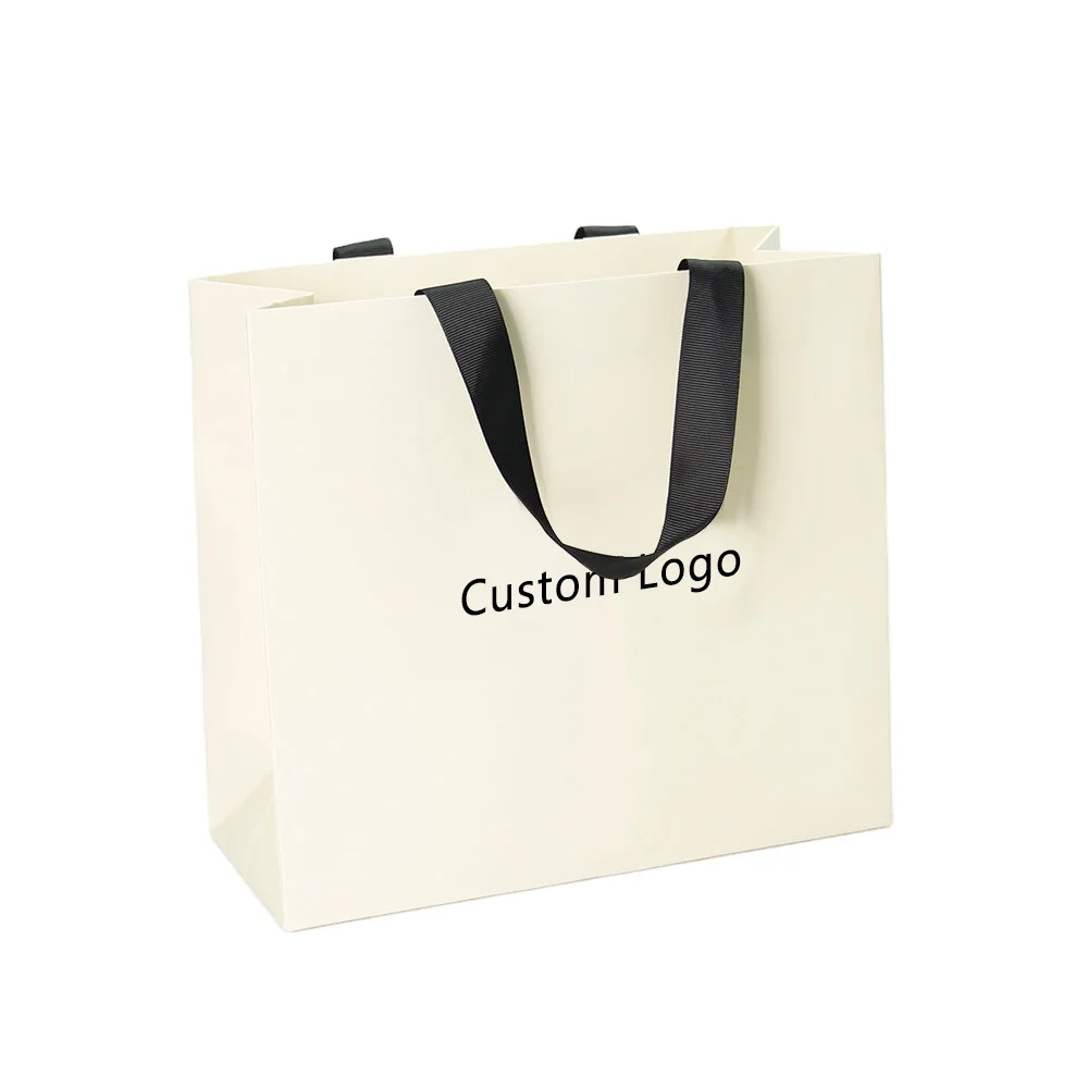 Hot selling cardboard shopping packaging bag luxury wedding white paper gift bag with ribbon handle