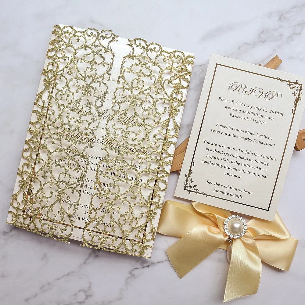 
Personalized Luxury Gold Glitter Lace Laser Cut Wedding Invitations with Jewel and Satin Bow 