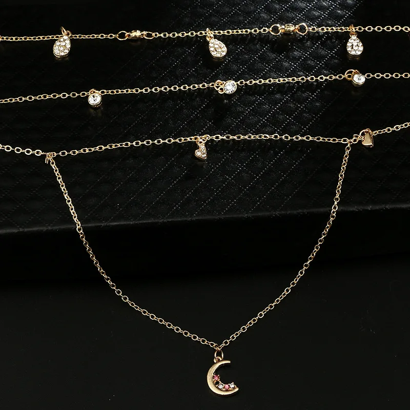 Wholesale and retail Korea simple geometric drop heart choker moon pendant short multi-layer necklace