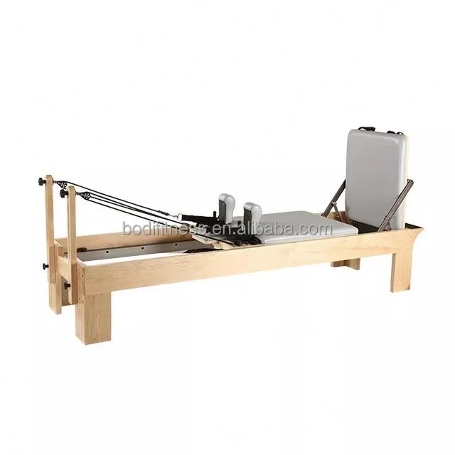 commercial Pilates studio box and jumpboard core bed wood pilates reformer