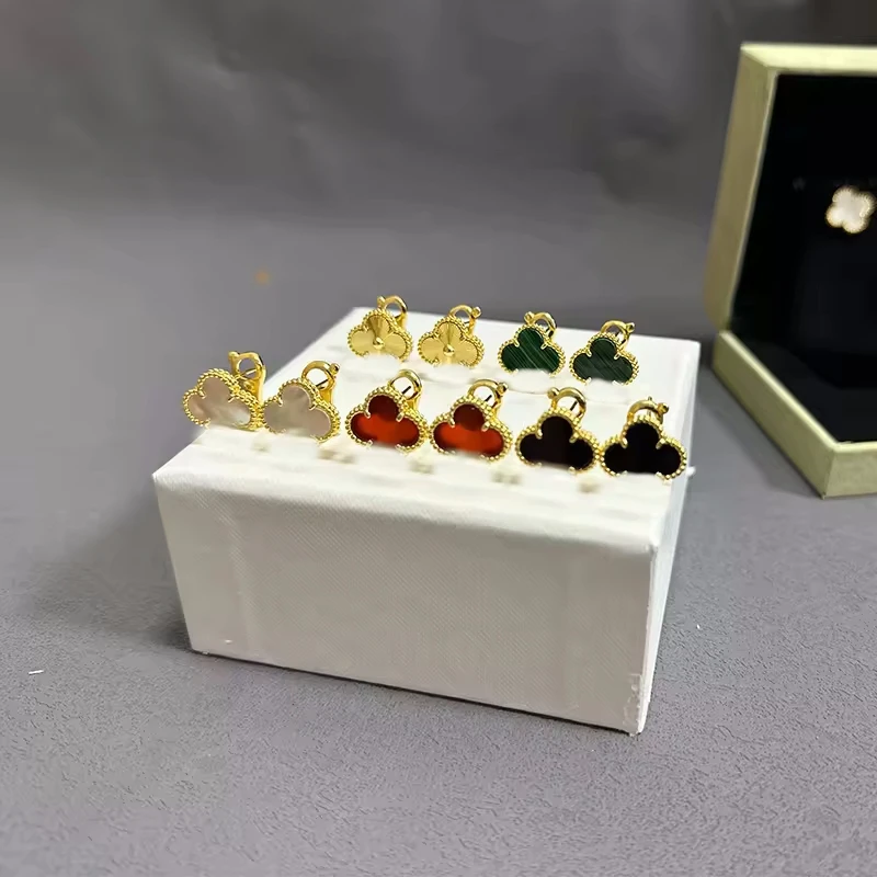 2024 New S925 Sterling silver four-leaf clover White Fritillaria Petals Fashion Earrings Women