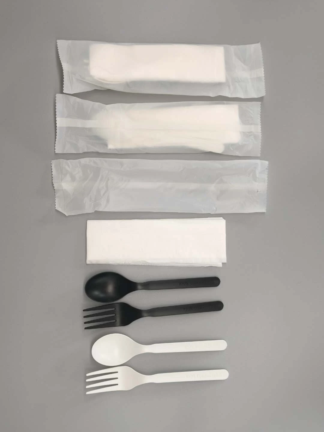 
GreenWorks degradable eco-friendly cutlery with Napkin ,white or black CPLA plastic fork and spoon dinnerware sets 