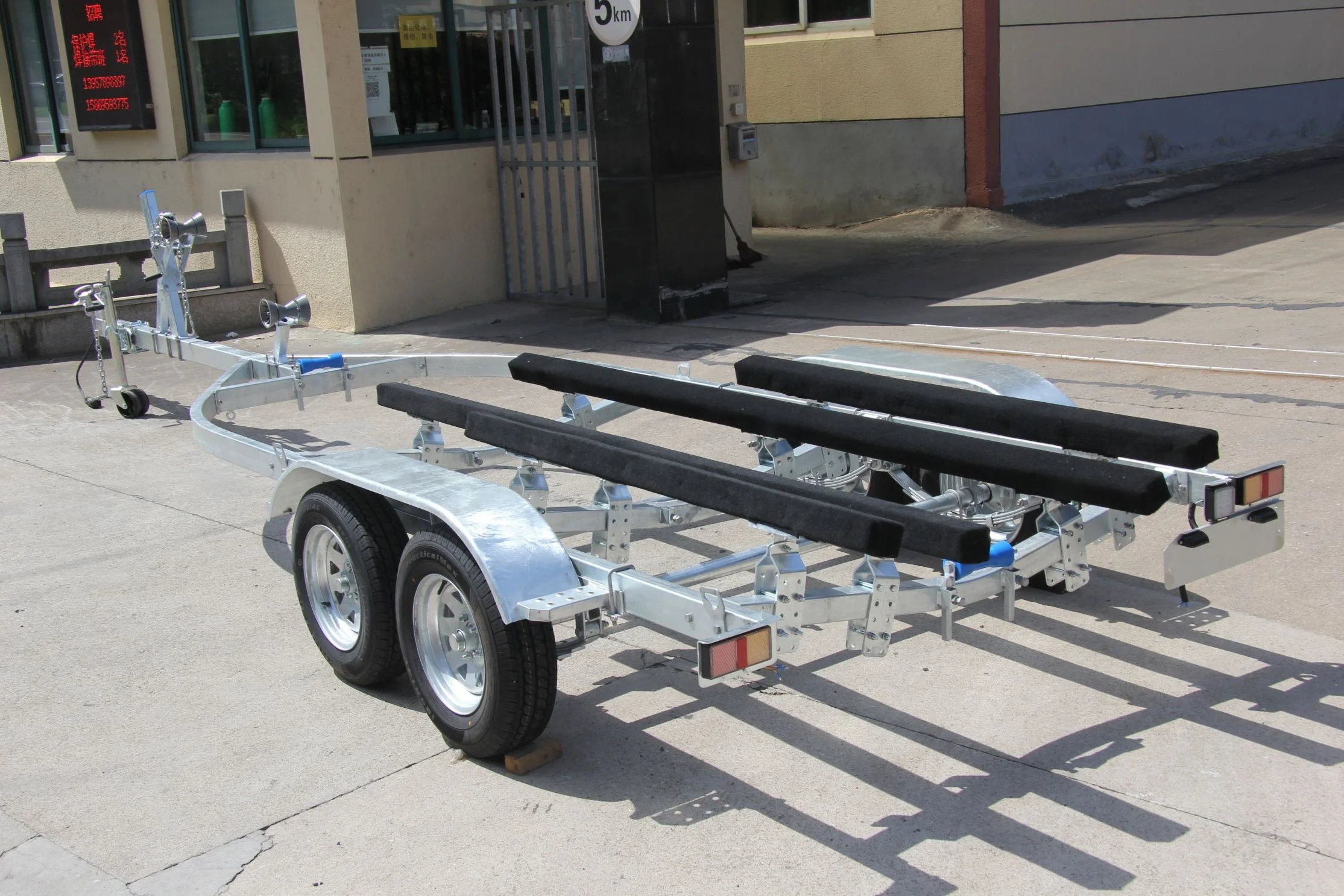 7.7M Long Heavy Duty Power Sport Four Wooden Bunks Four Wheels Boat Trailer Jet Ski with 2.5 Ton Capacity