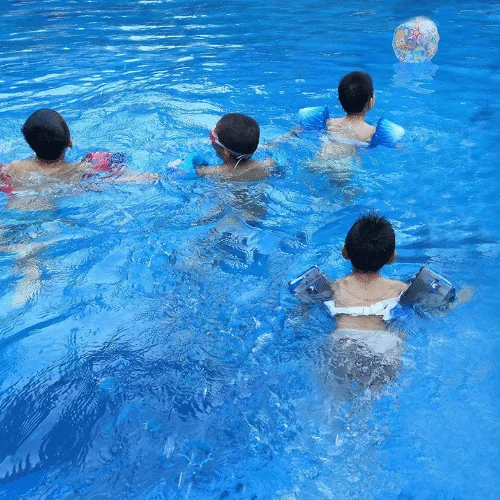 Customized inflatable arm life jacket children water park vest with cartoon pattern swimming pool float life saving jacket