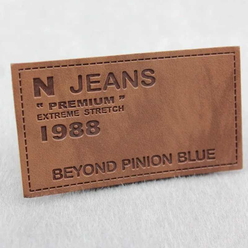 Logo Design Garment Jeans label patch, Genuine PU Custom Embossed Leather label