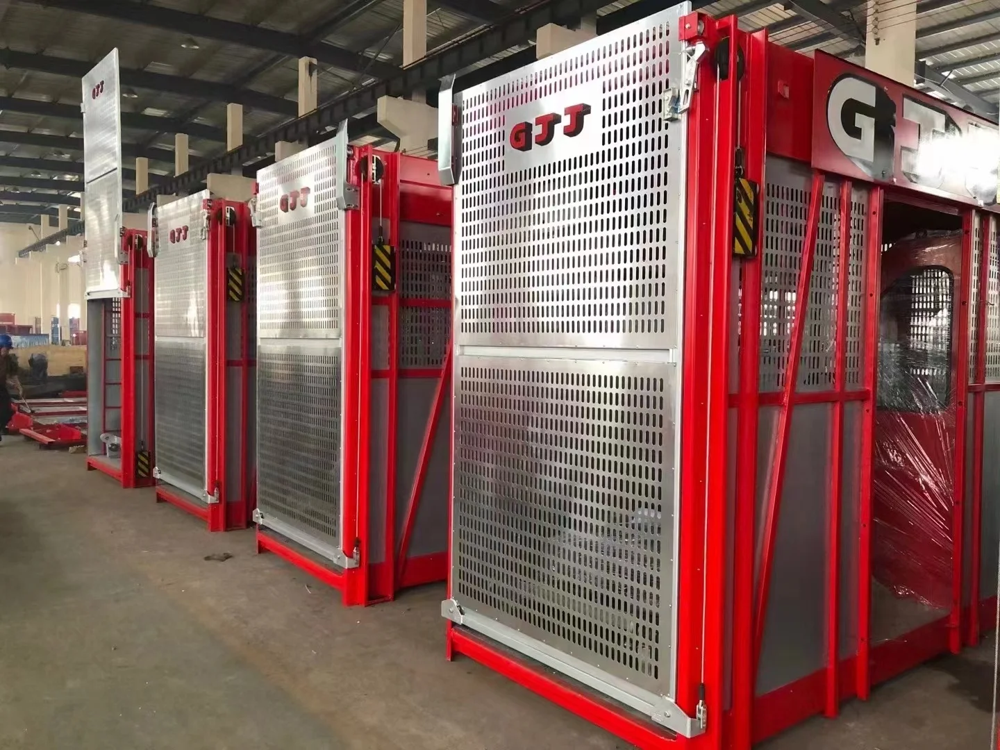GJJ New Condition Twin Cage Electric Construction Elevator Steel Material Passenger Motor Core Engine with Gearbox Gear Hotels