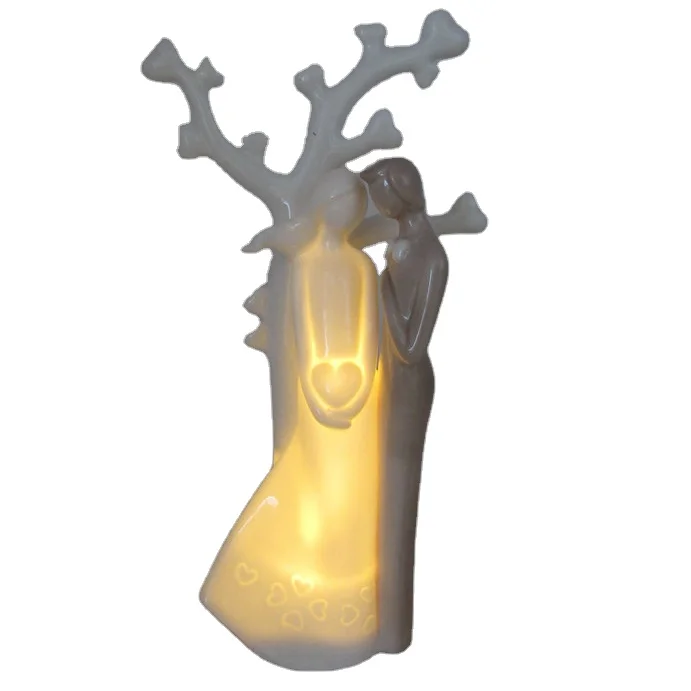 
Customized Wedding porcelain figurine statue, Kiss couple figurines with Led light 