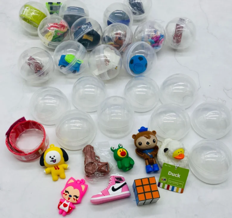 Cheap promotional gift capsule toy 65mm plastic surprise egg capsule ball toy vending machine ball for children