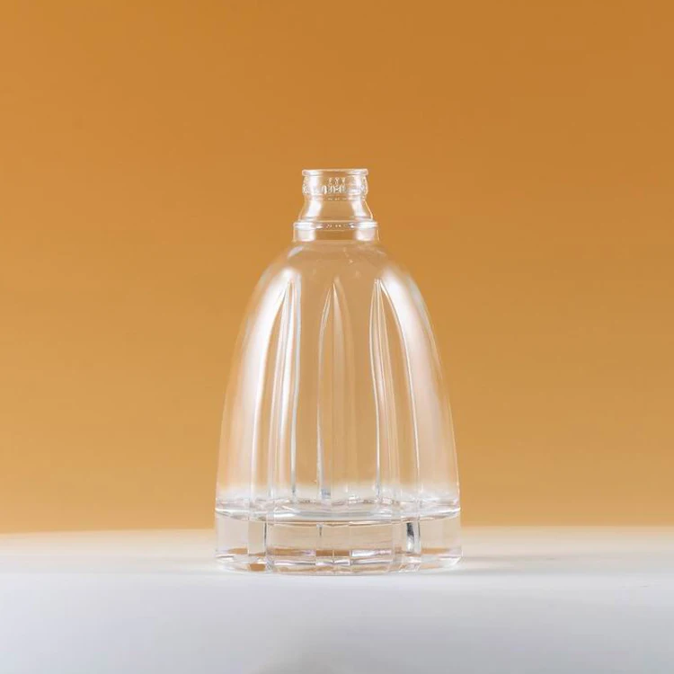 Wholesale high quality flat shape transparent glass bottle for brandy XO wine.
