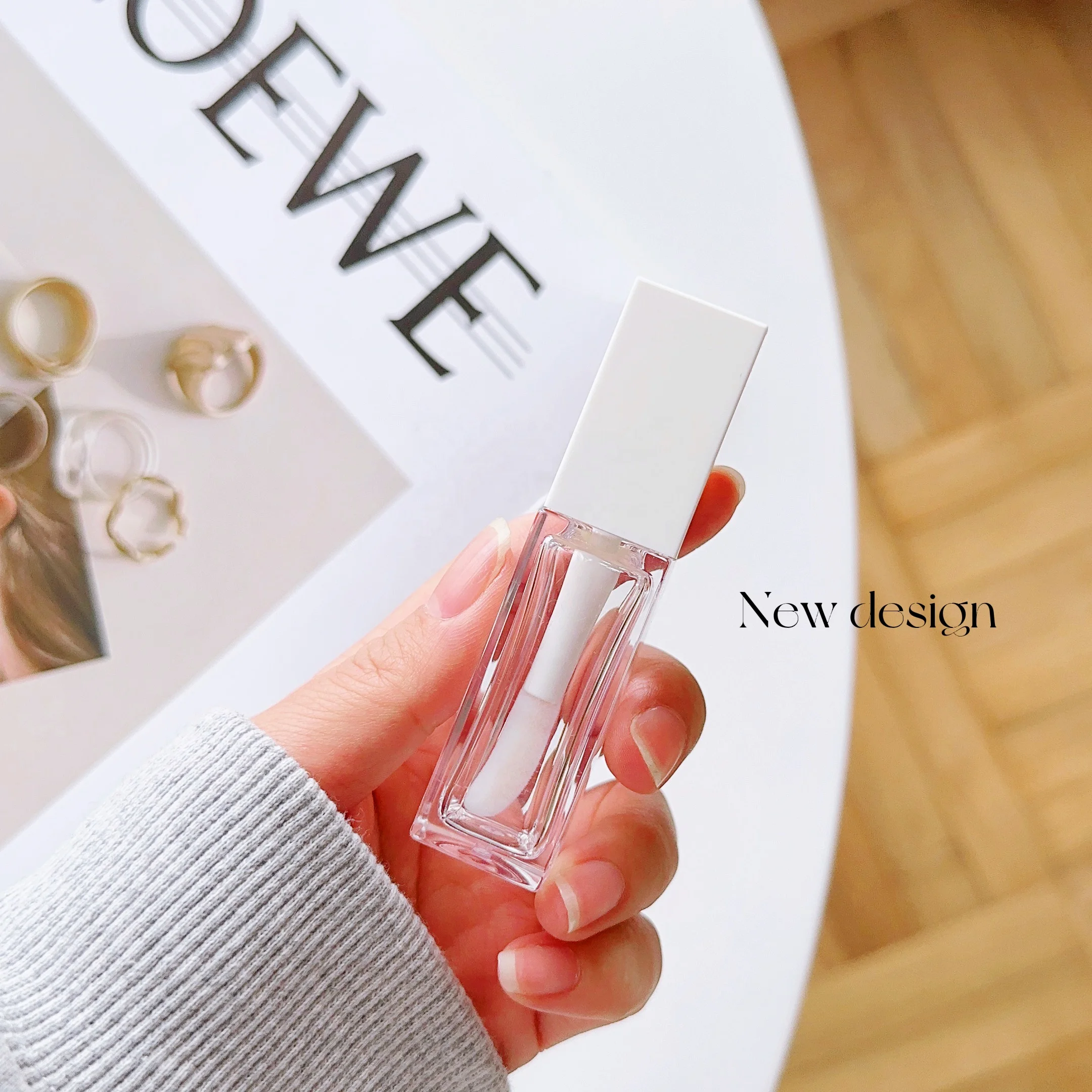 New design wholesale custom logo new lip gloss packaging bottle 8ml lip gloss tubes with big wands