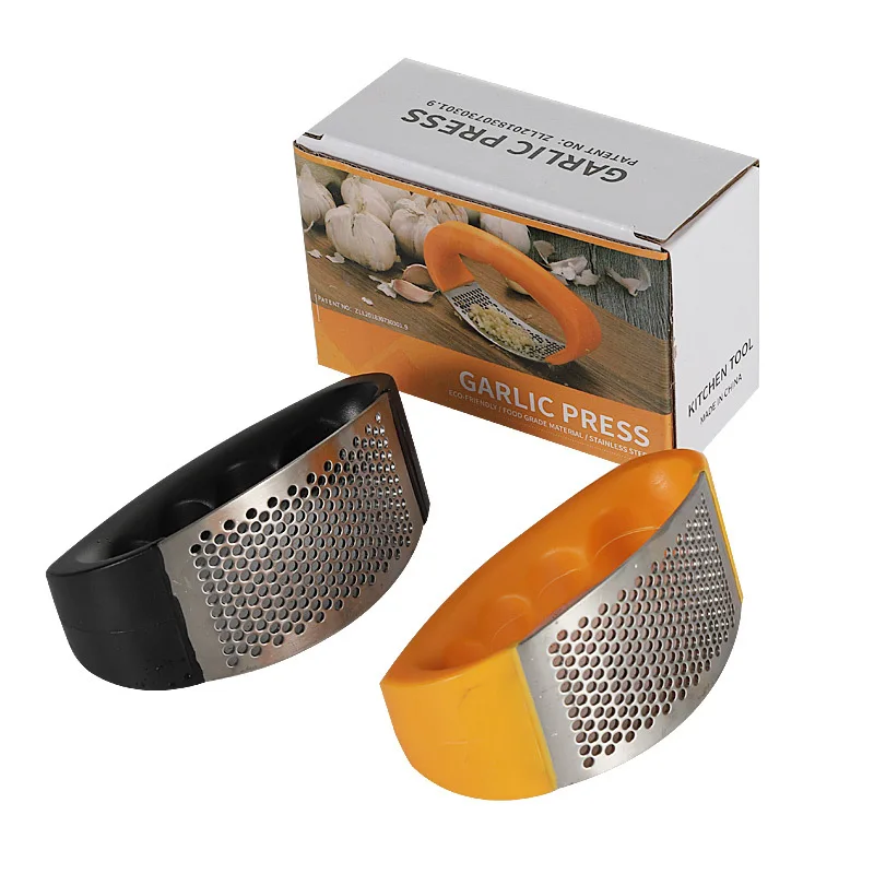 Wholesale multifunctional manual garlic press household kitchen universal compact portable stainless steel garlic press