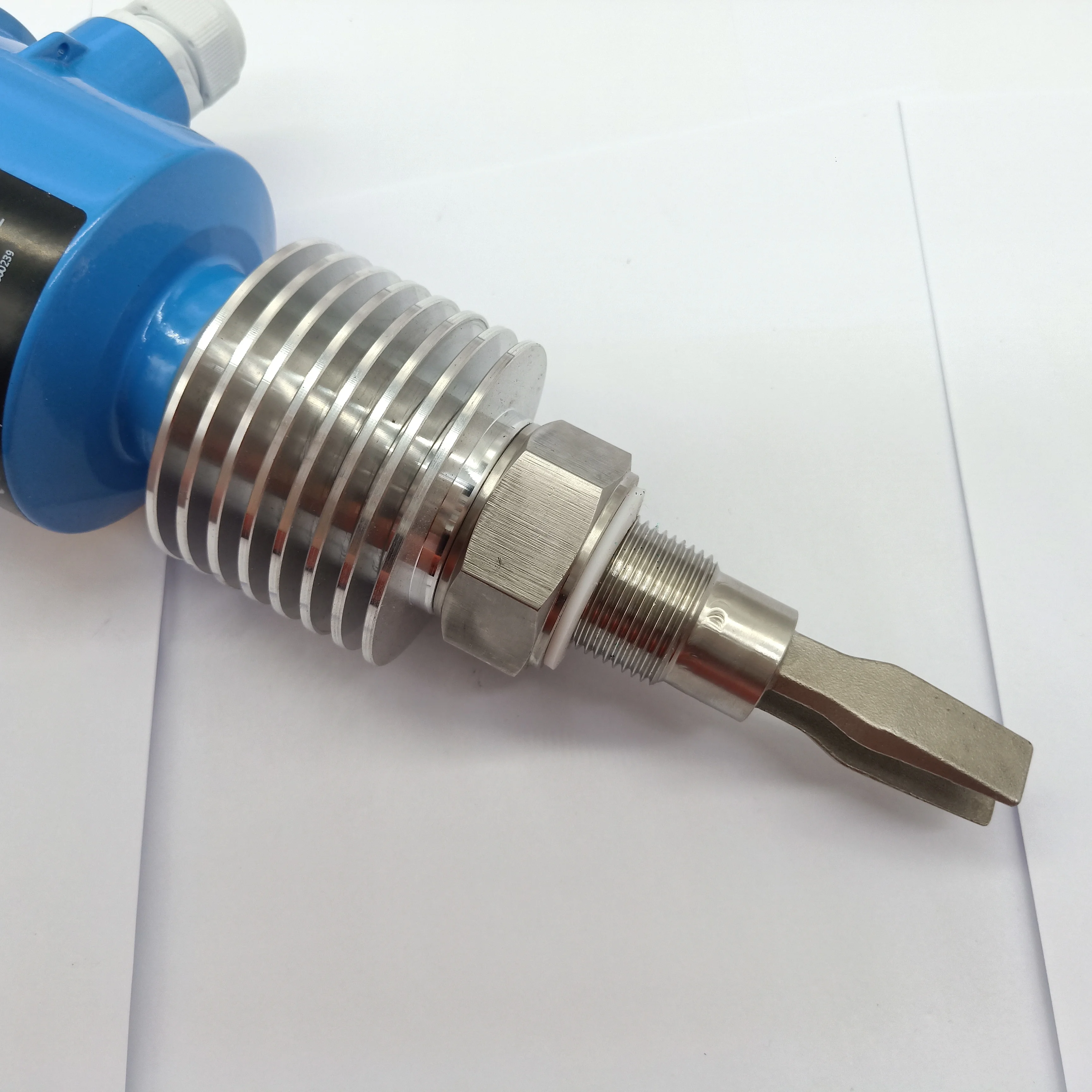 Tuning fork level switch for solid vibrating rod level switch