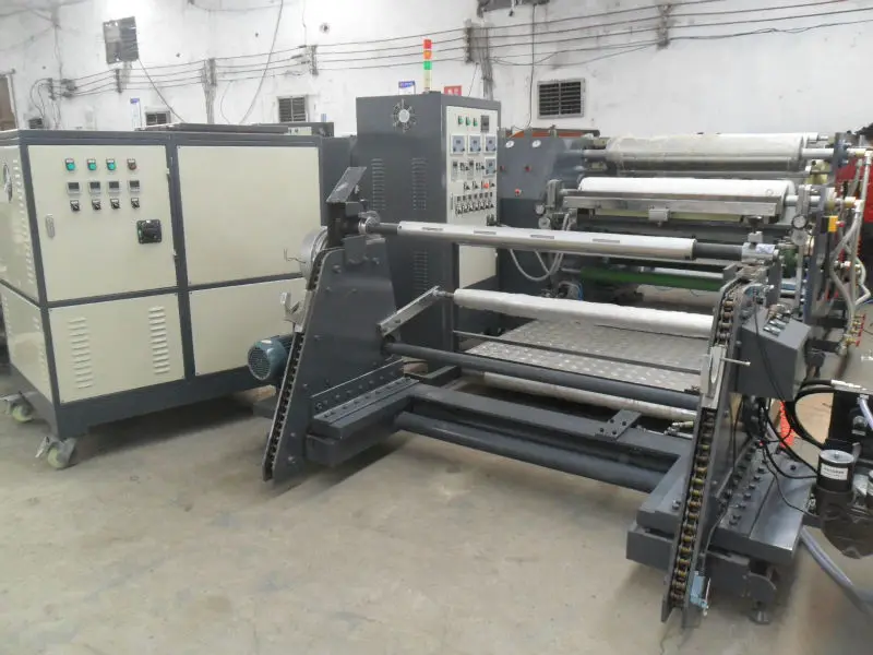 Porous elastic adhesive bandage coating machine