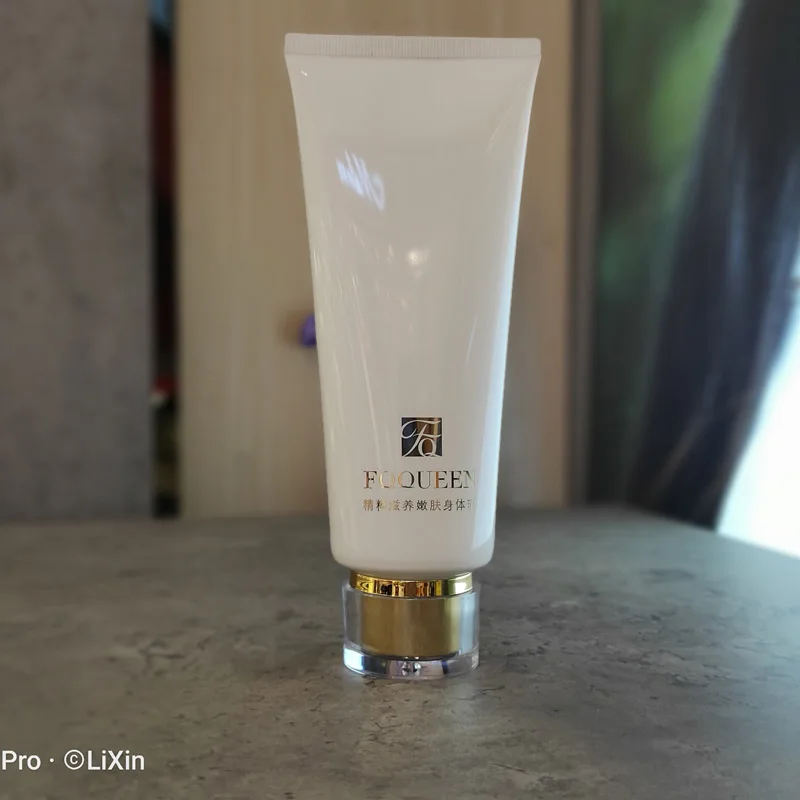 
Wholesale 200ml hot stamping White Body lotion tube Facial Cleanser plastic cosmetic tube packaging with gold acrylic screw cap 