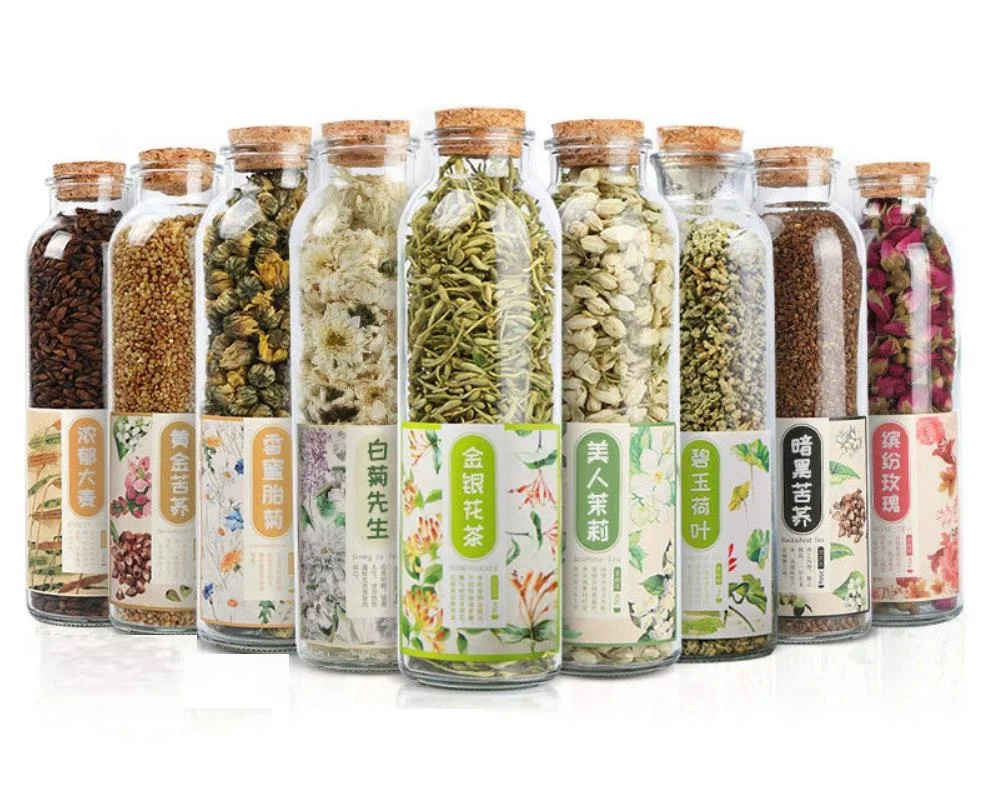 Gift packages dry flowers buds and herbals  for tea or decoration  in glass bottles