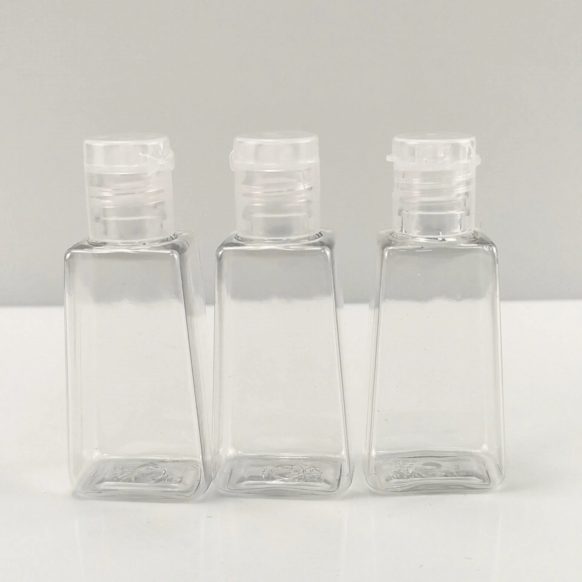 60ml T shape mini small travel 1oz 30ml gel hand sanitizer bottle with silicone holder