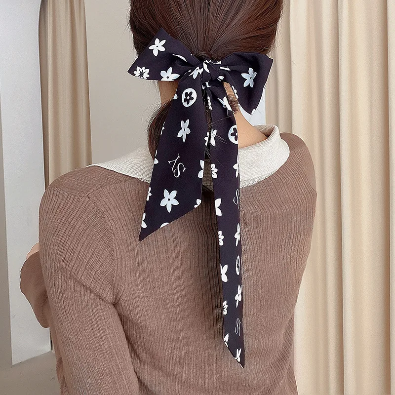 Thin and narrow strip tie women 2021 French retro hair scarf ins wind gentle and elegant hair band tie strap