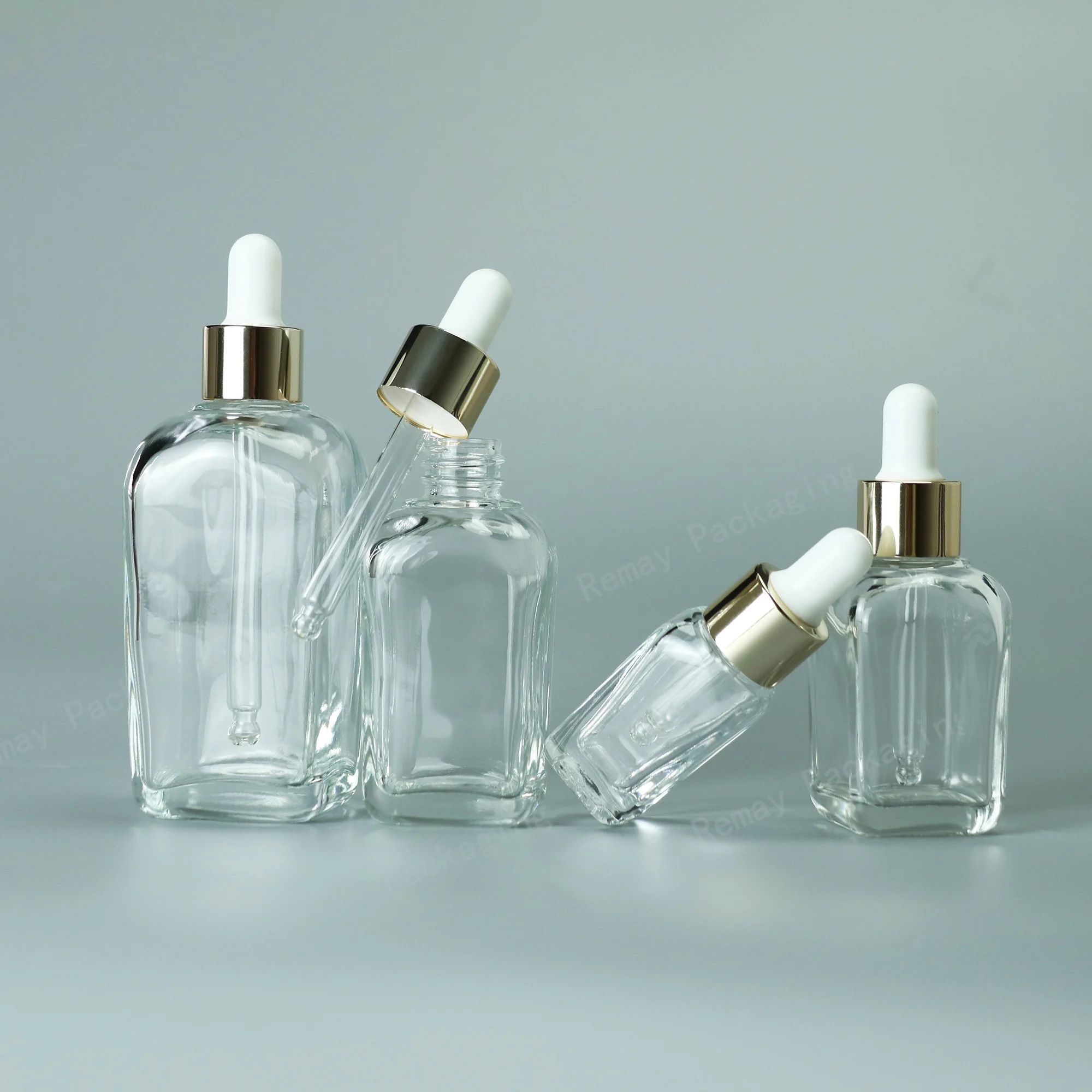 Customized clear square glass essential oil dropper bottle 30ml cosmetic pipette serum bottles with gold dropper cap in stock