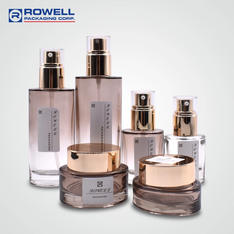 2022 Hot Sales 100ml Lotion Pump Glass Bottle with ALU Gold Press Pump Packaging