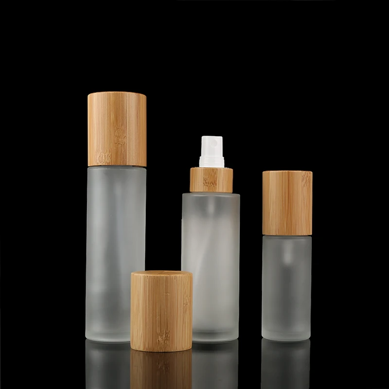 Eco-friendly 30ml 50ml 100ml 150ml Bamboo Frosted Glass Lotion Bottle White Glass Sprayer Pump Bottlewith bamboo lid