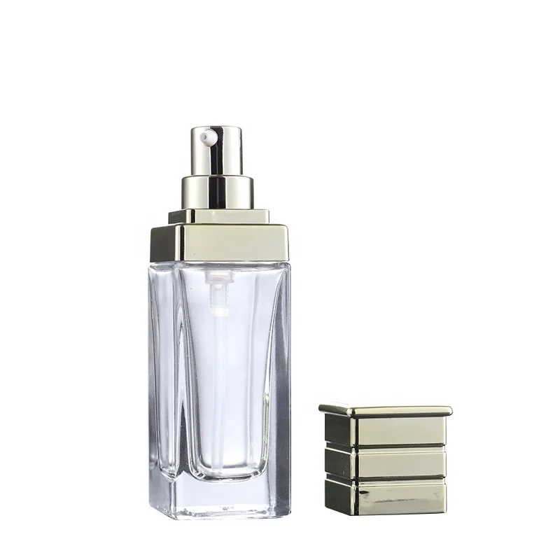 Custom electroplated or frosted process transparent square glass lotion bottles 30ml with golden pump lid