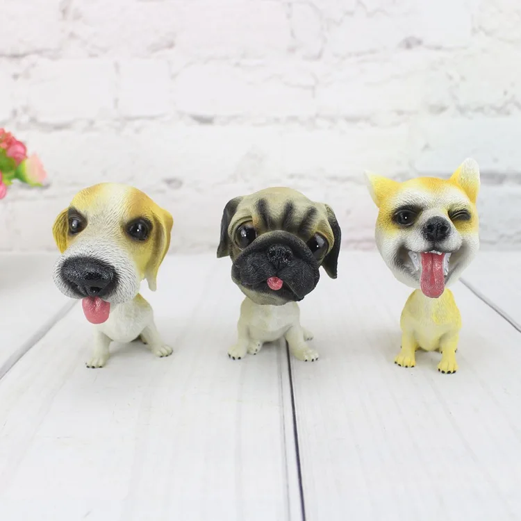 Cute doll simulation resin spring shake head dog car interior decoration lucky pet dog