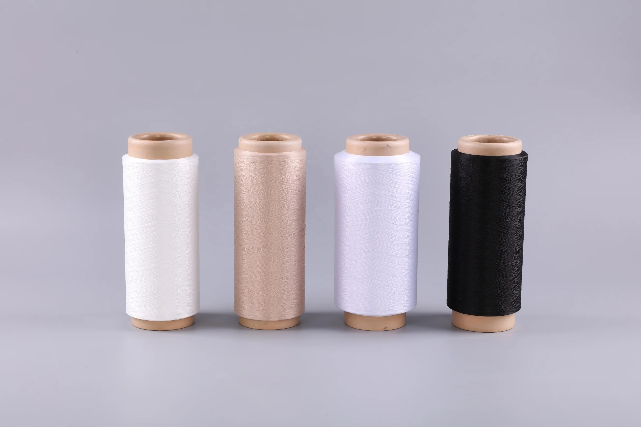 OEKO-TEX Standard quality 100% nyloan yarn 70D/2 100D/2 NIM twisted DTY nylon yarn nylon twisted DTY yarn with TPM 80-120
