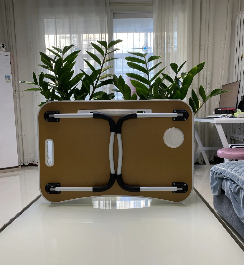 Portable and adjustable Mac laptop bed stand desk laptop desk suitable for home work travel and comes with a cup holder