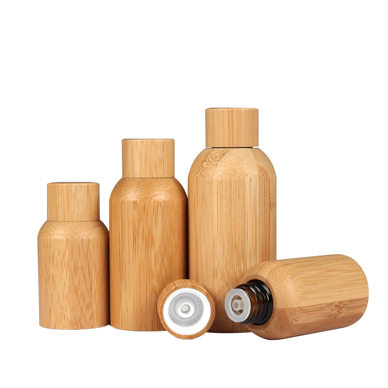 Eco Friendly Bamboo Essential Oil Packaging 10ml 30ml 50ml 100ml Empty Cosmetics Glass Container With Natural Bamboo Wood Shell