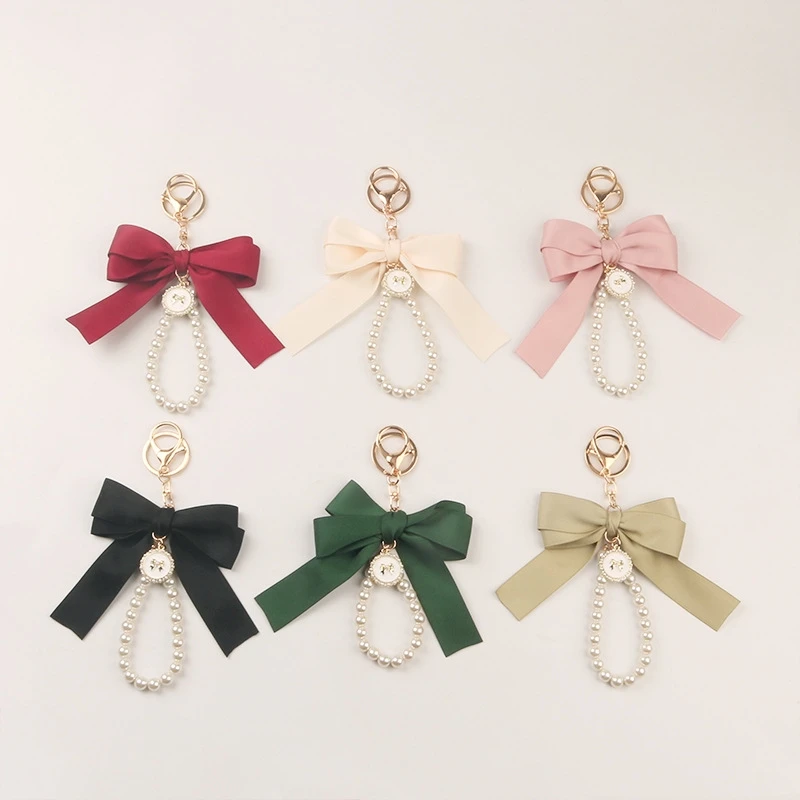 Cute pearl charm keychain Fashion kawaii Bow Ribbon Pearl keychain Key rings for Women Purse Car earphone case Decor Accessories