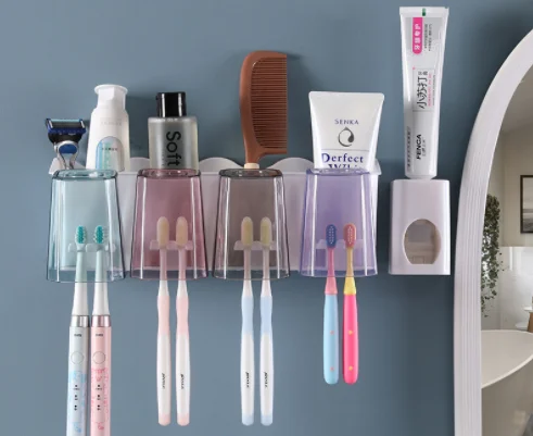 RTS High volume and excellent price free punching toothbrush shelf with cup set wall mounted automatic toothpaste squeezer