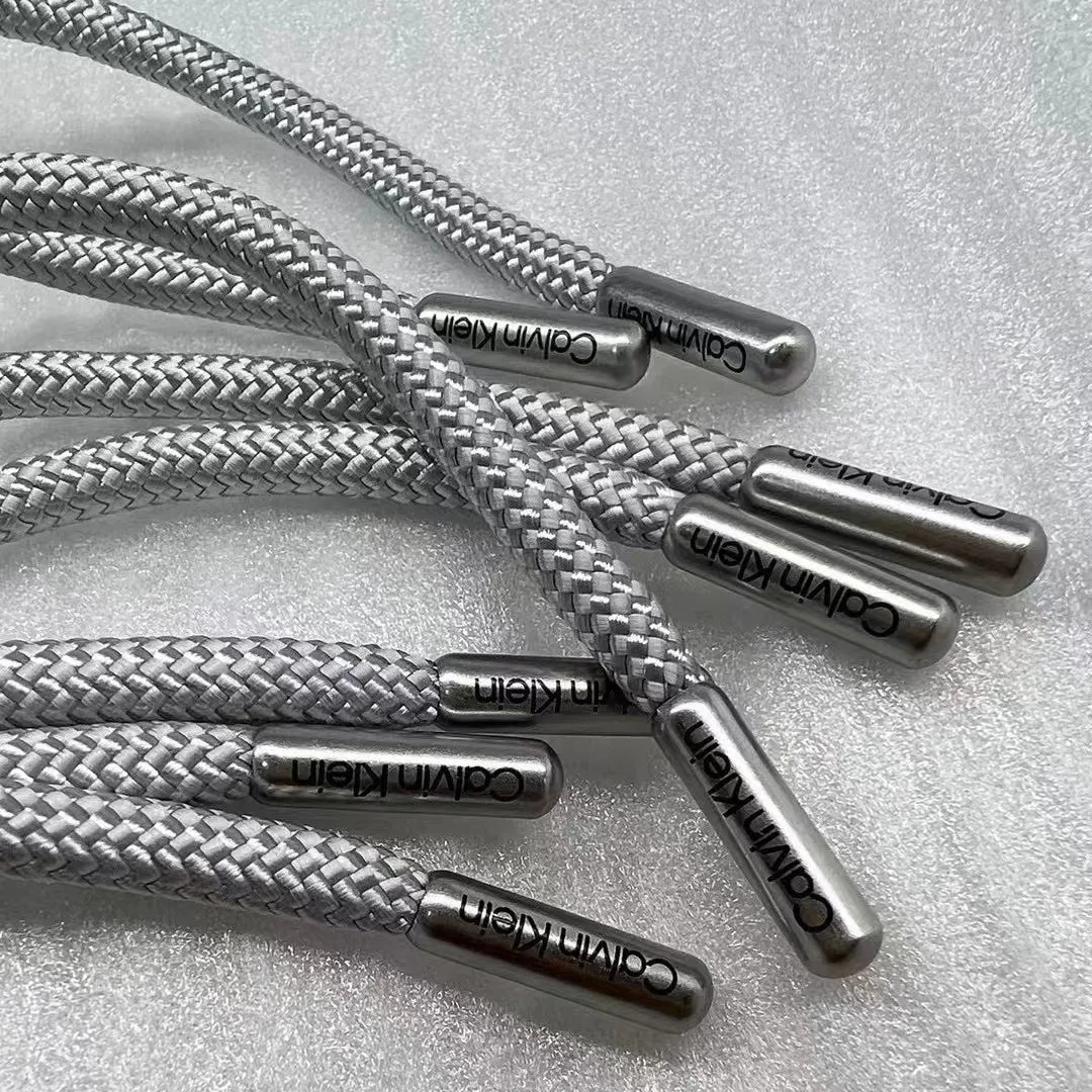 Custom engraved logo Metal Aglet high quality hoodie pull rope tips Metal rope tips Metal tip Aglets