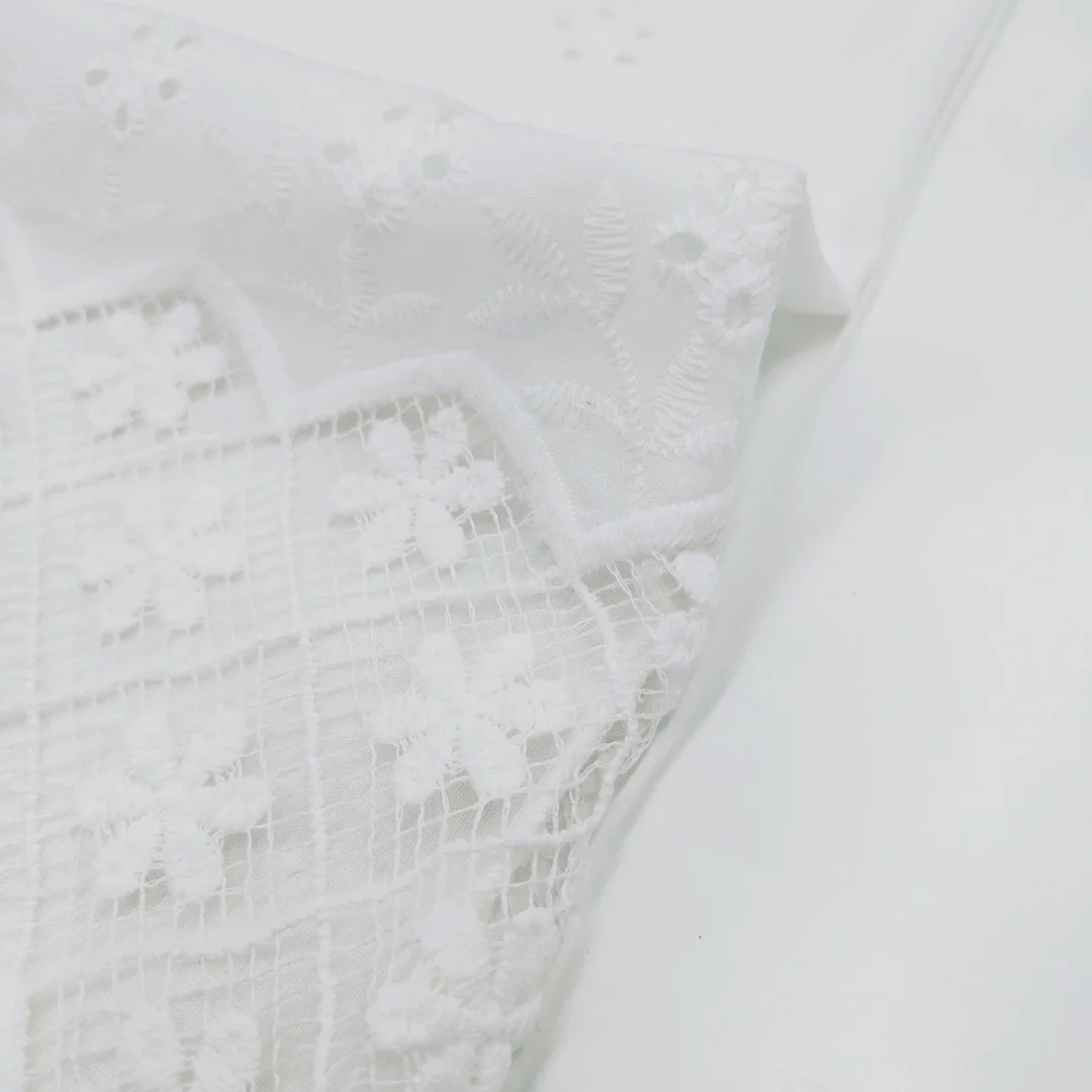 Stunning White Punched Design  fabric Adding a Splash of Color customized pure cotton  embroidery fabric for Tops