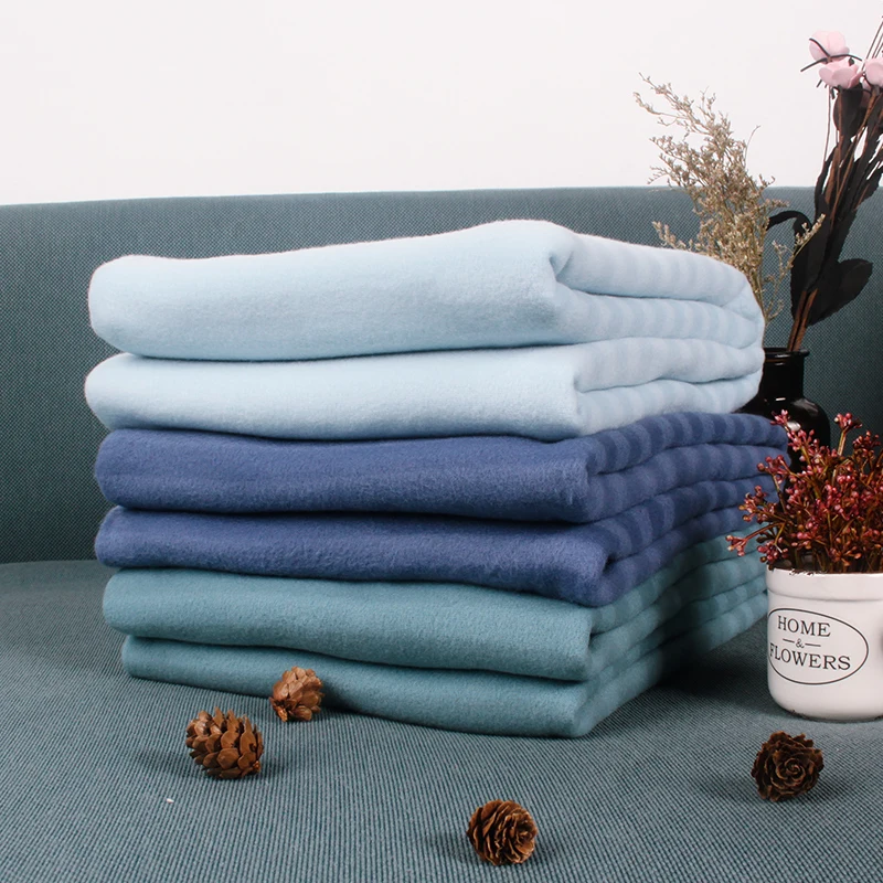 Wholesale customized 100% polyester double Brushed fleece warn comfort super soft sofa knitted throw blanket for