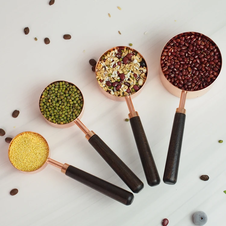
Hot Selling 4pcs copper Stainless Steel Rose gold Measuring Cups set With Wooden Handle 