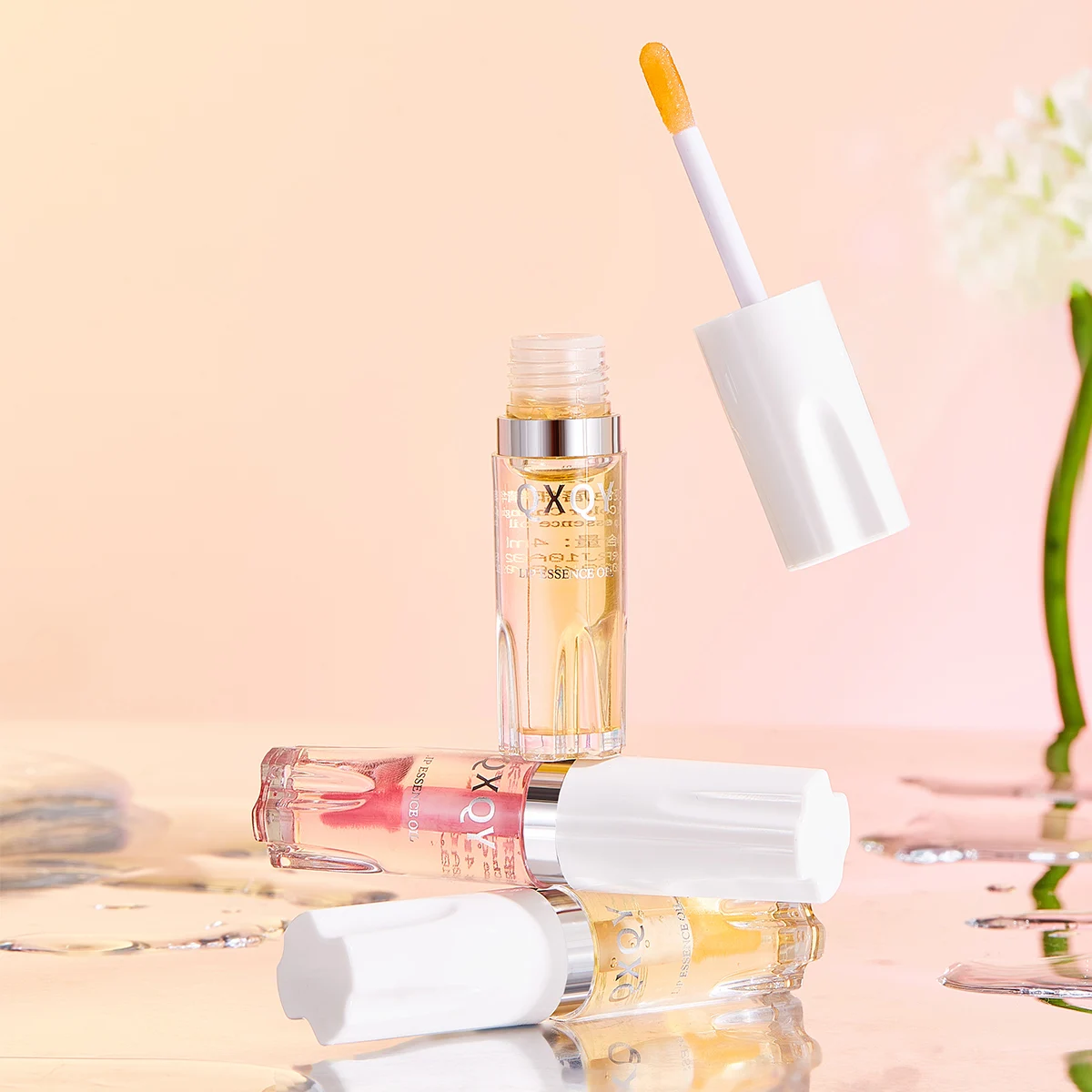 QXQY OEM ODM Wholesale Base Lip Gloss Moisturizing And Glossy Lip Care Layering Light Color Changing Lip Essence Oil