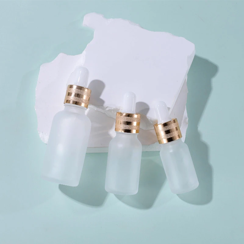 Empty Cuticle Oil Body Oil Container 5ml 10ml 15ml 20ml 30ml 50ml 100ml Frosted Glass Serum Dropper Bottle with Golden Sand Top
