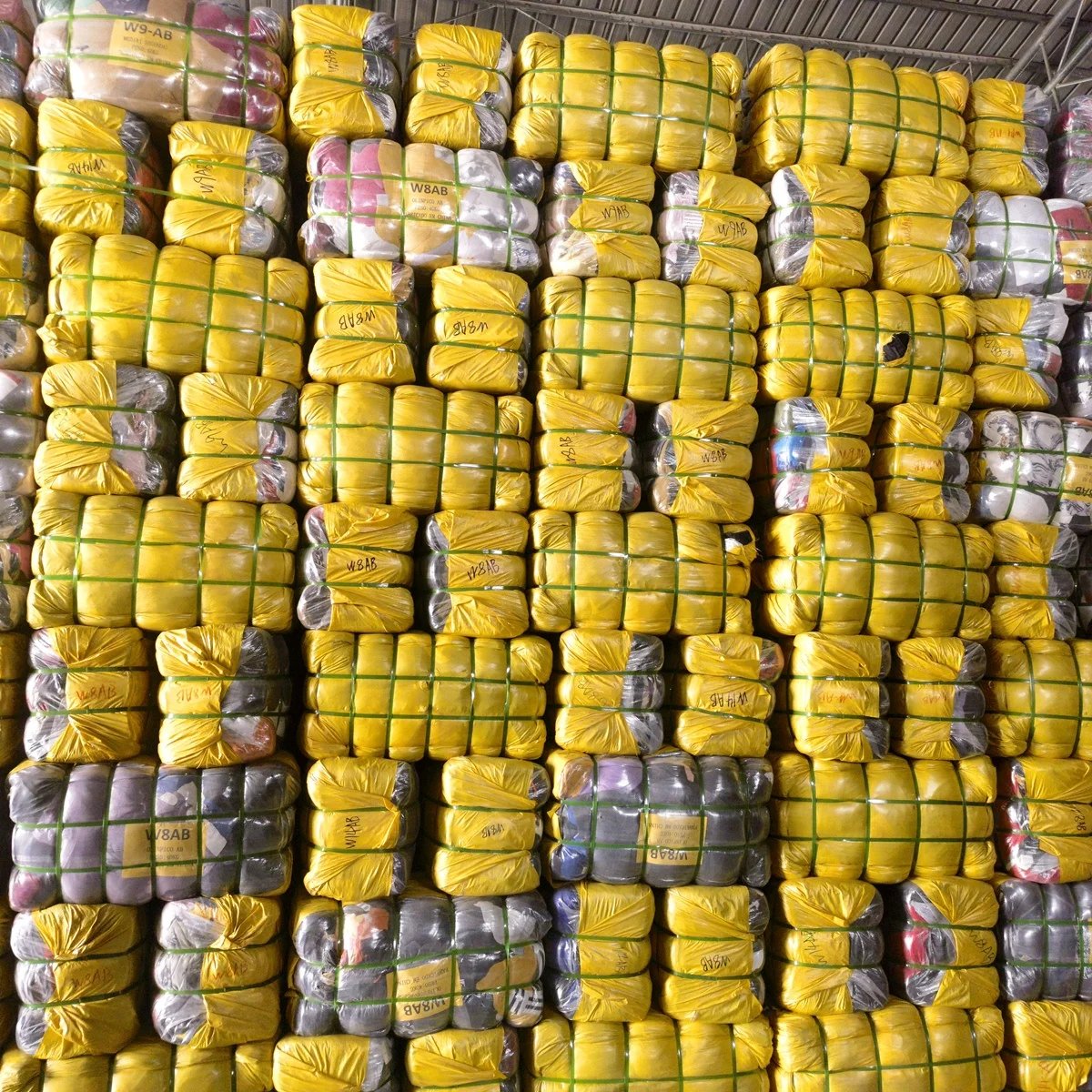 Import Vintage Thrift Store clothes used apparel bales second hand jeans denim trousers pants clothing