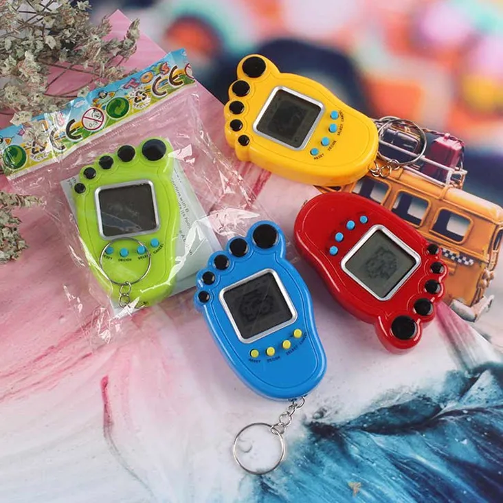 New foot mini electronic pet machine handheld mini game keychain pendant