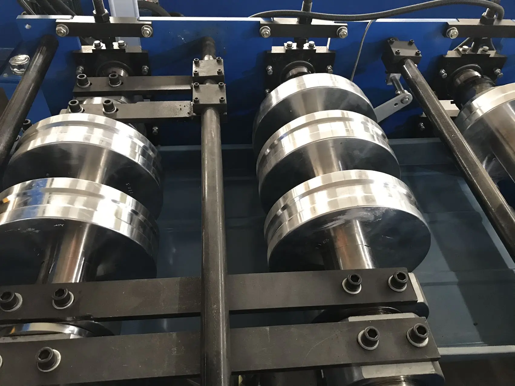 OEM ODM Customized zinc standing seam cladding steel roofing sheet roll forming machine