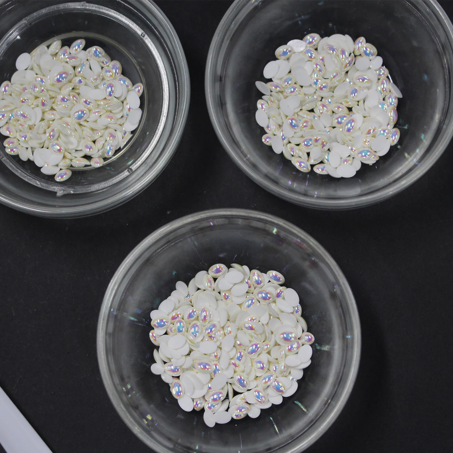 Wholesale 6*4mm ellipse shape epoxy resin , hot fix lead-free epoxy rhinestone which can be customized in different colors