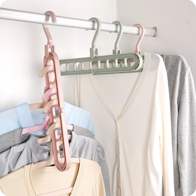 Multifunctional nine-hole hangers Rotating magic hangers Folding drying racks storage closet