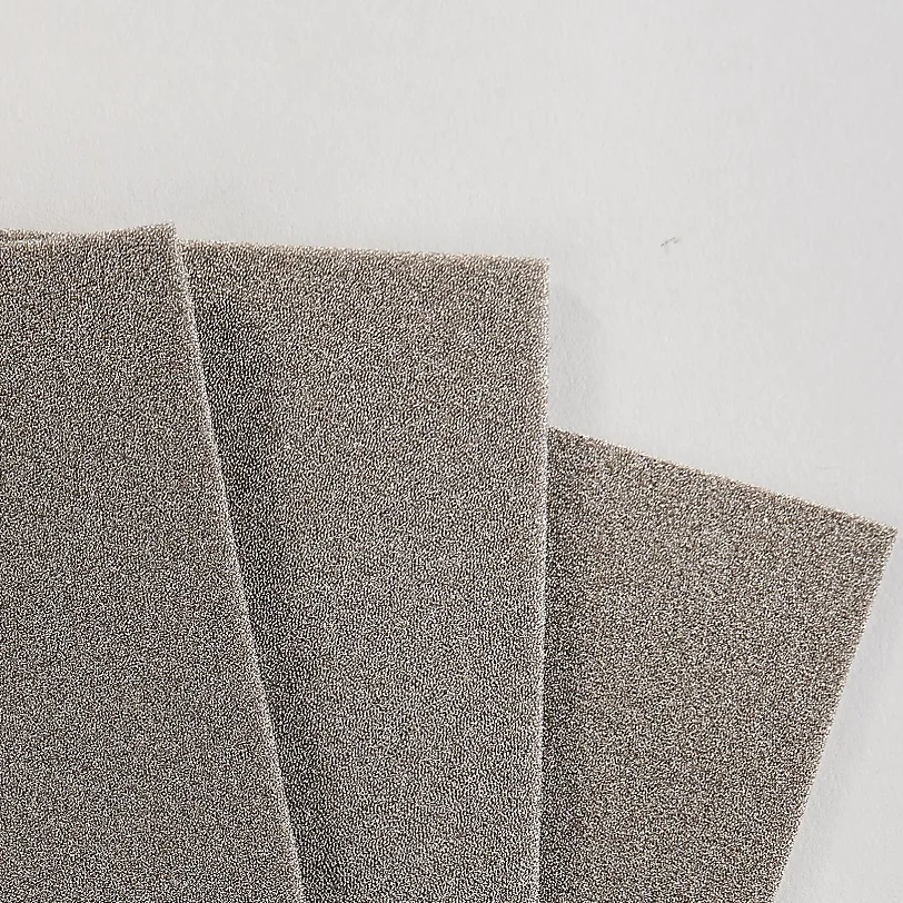 Metallic Conductive Sponge Polymer Composites Z-Foam Gasket Laminated with Adhesive Film Coated Fabric for Accessory Use