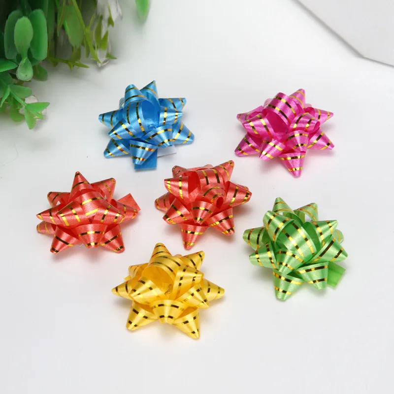 Разноцветные ленты с бантом в виде звезд для подарочной упаковки