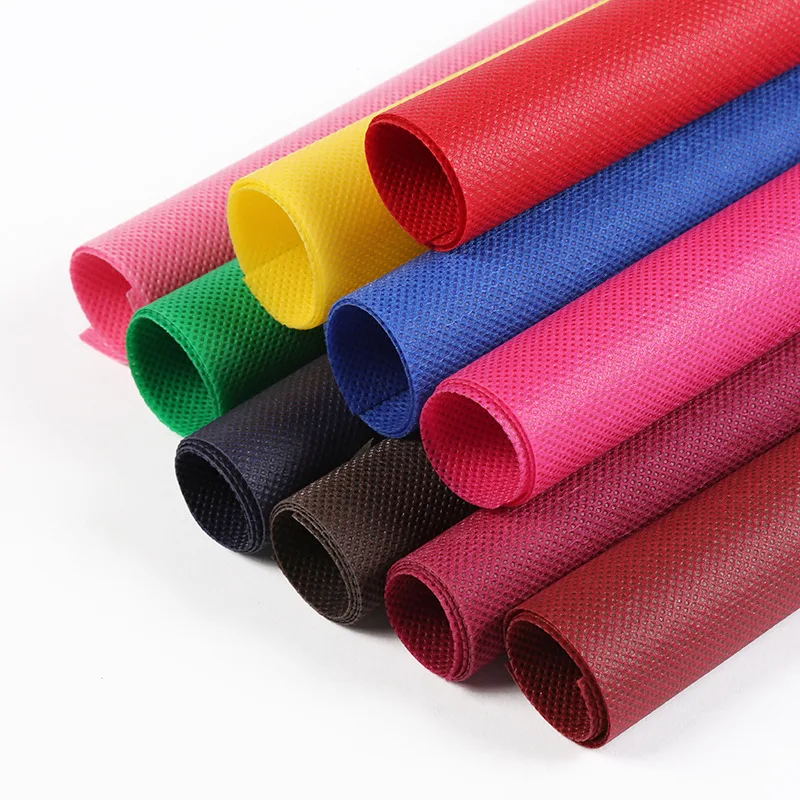  non woven raw materil Manufacturer protective coverall china TNT PP Spunbond nonwoven fabric rolls for disposable massage sheet
