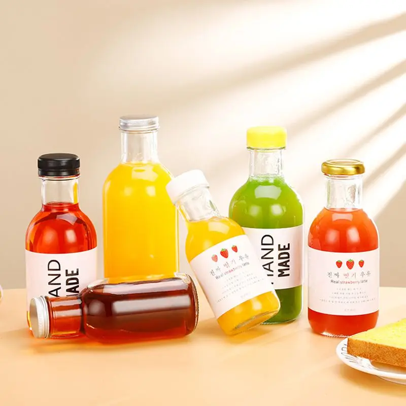Hot Sale Eco-friendly Glass Beverage Bottles 250ml 350ml 500ml Screw Cap Seal Juice Coffee Soda Wine Custom Logo Carton Packing