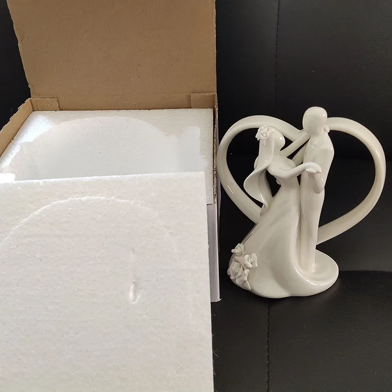 
Ywbeyond Wholesale Ceramic Dancing Bride and Groom Couple Heart Figurine Cake Topper wedding Table decoration 